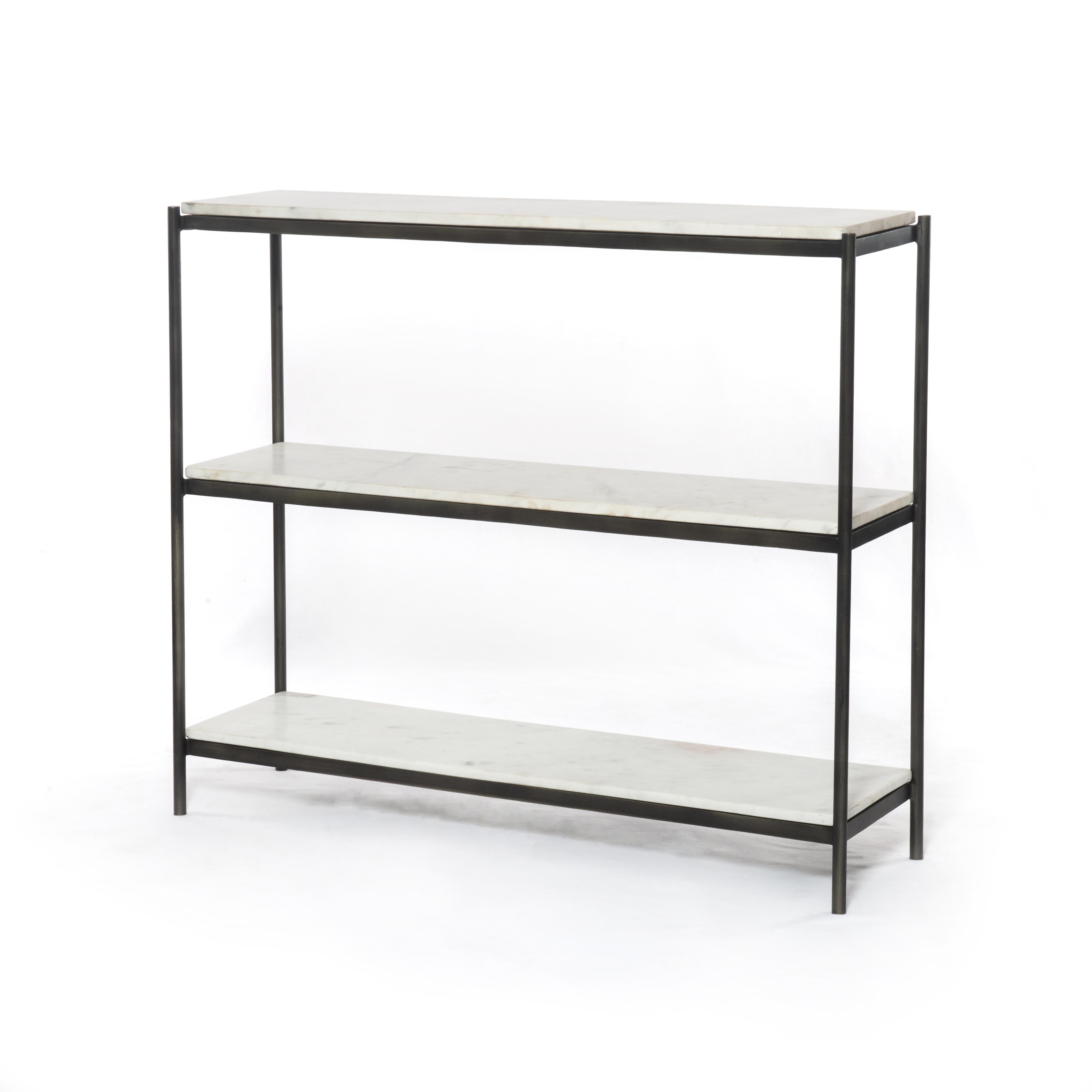 Featuring Felix Hammered Grey Small Console Table by Four Hands at Amethyst Home. Add a pop of sophistication to any space. Polished white marble lays three tiers of smooth shelving for an open style with plenty of surface area. Hammered grey framing places a feminine-industrial spin on console storage.
Overall Dimensions: 36"W x 10"L x 31"HColors: Hammered . Amethyst Home provides interior design, new home construction design consulting, vintage area rugs, and lighting in the Monterey metro area.
