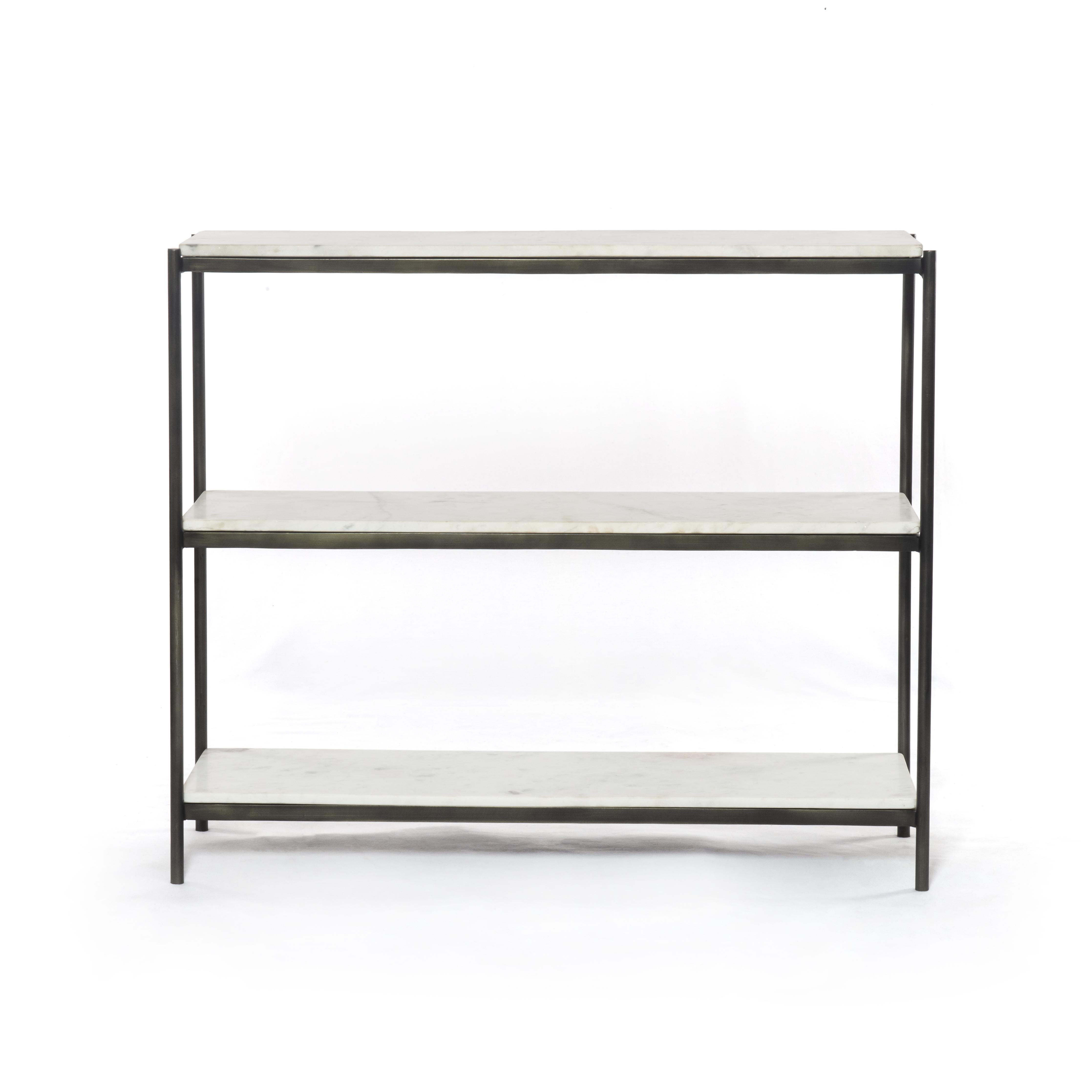Add a pop of sophistication to any space. Polished white marble lays three tiers of smooth shelving for an open style with plenty of surface area. Hammered grey framing places a feminine-industrial spin on console storage. Amethyst Home provides interior design, new home construction design consulting, vintage area rugs, and lighting in the Salt Lake City metro area.