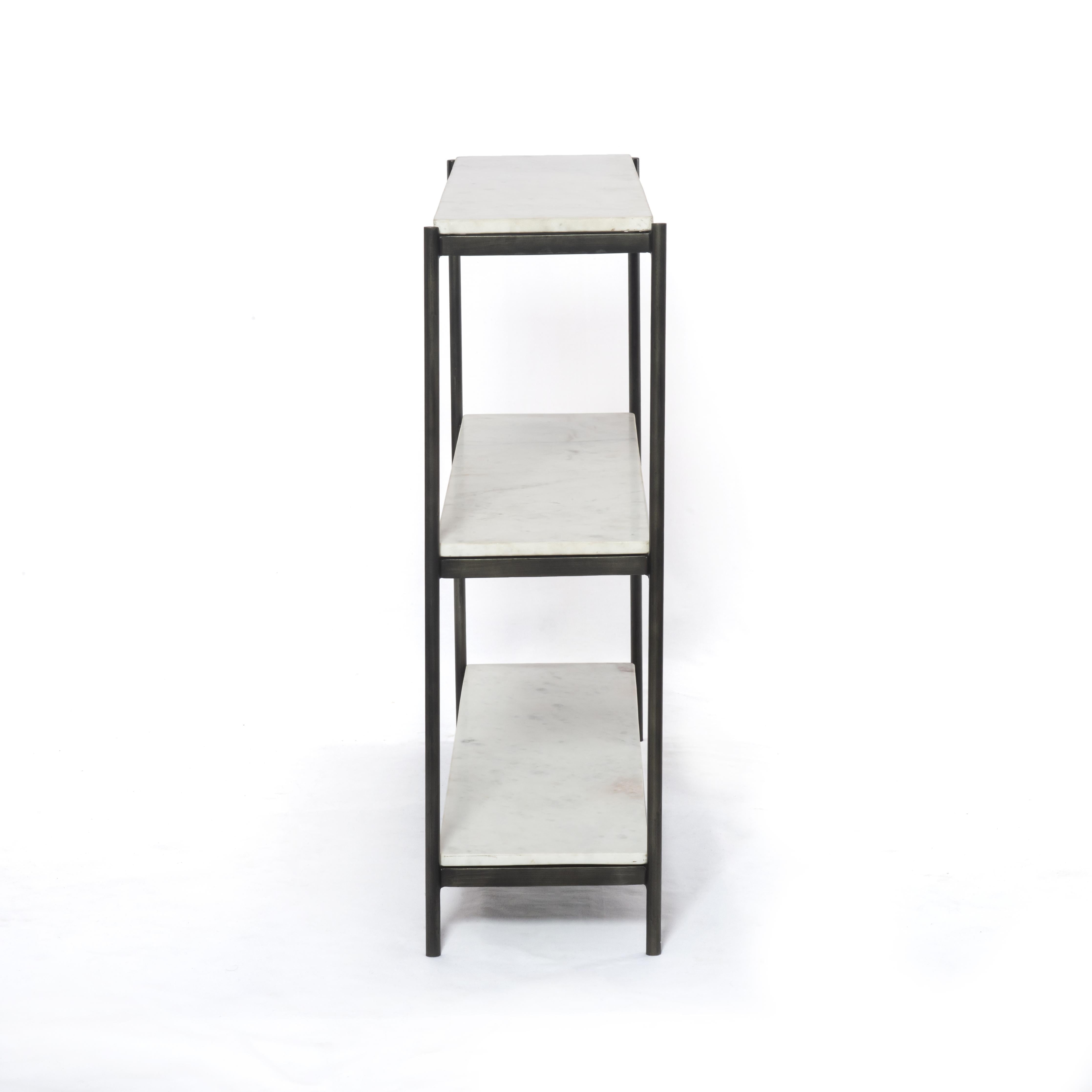 Featuring Felix Hammered Grey Small Console Table by Four Hands at Amethyst Home. Add a pop of sophistication to any space. Polished white marble lays three tiers of smooth shelving for an open style with plenty of surface area. Hammered grey framing places a feminine-industrial spin on console storage.
Overall Dimensions: 36"W x 10"L x 31"HColors: Hammered G. Amethyst Home provides interior design, new home construction design consulting, vintage area rugs, and lighting in the Seattle metro area.