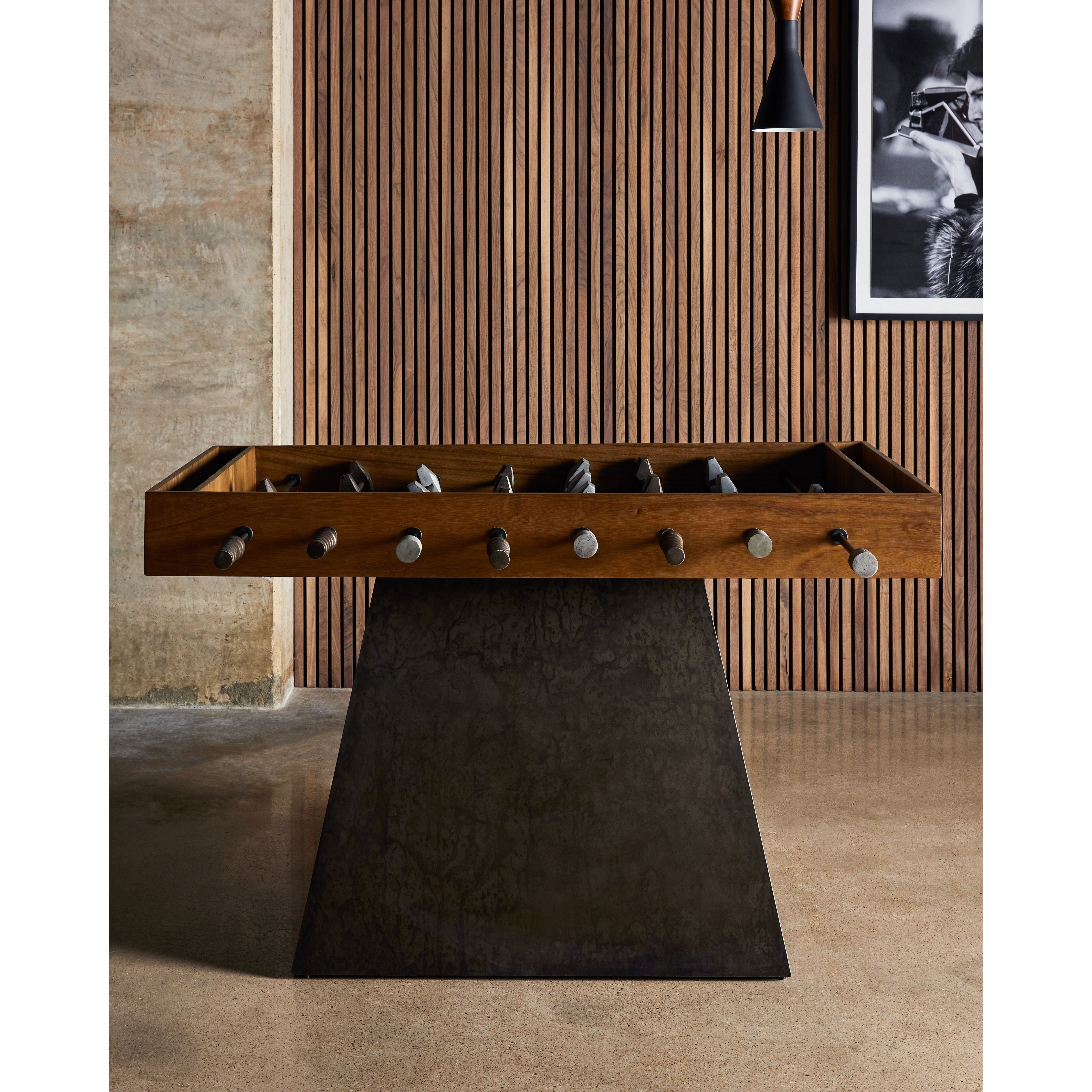 Handmade by skilled artisans, the Foosball Natural Brown Guanacaste Table is a one-of-a-kind game that features a beautiful blend of hand-finished Guanacaste wood and metal that’s been aged through a manual, month-long process using natural elements to bring unique character to each piece. Includes three balls. Amethyst Home provides interior design services, furniture, rugs, and lighting in the Dallas metro area.