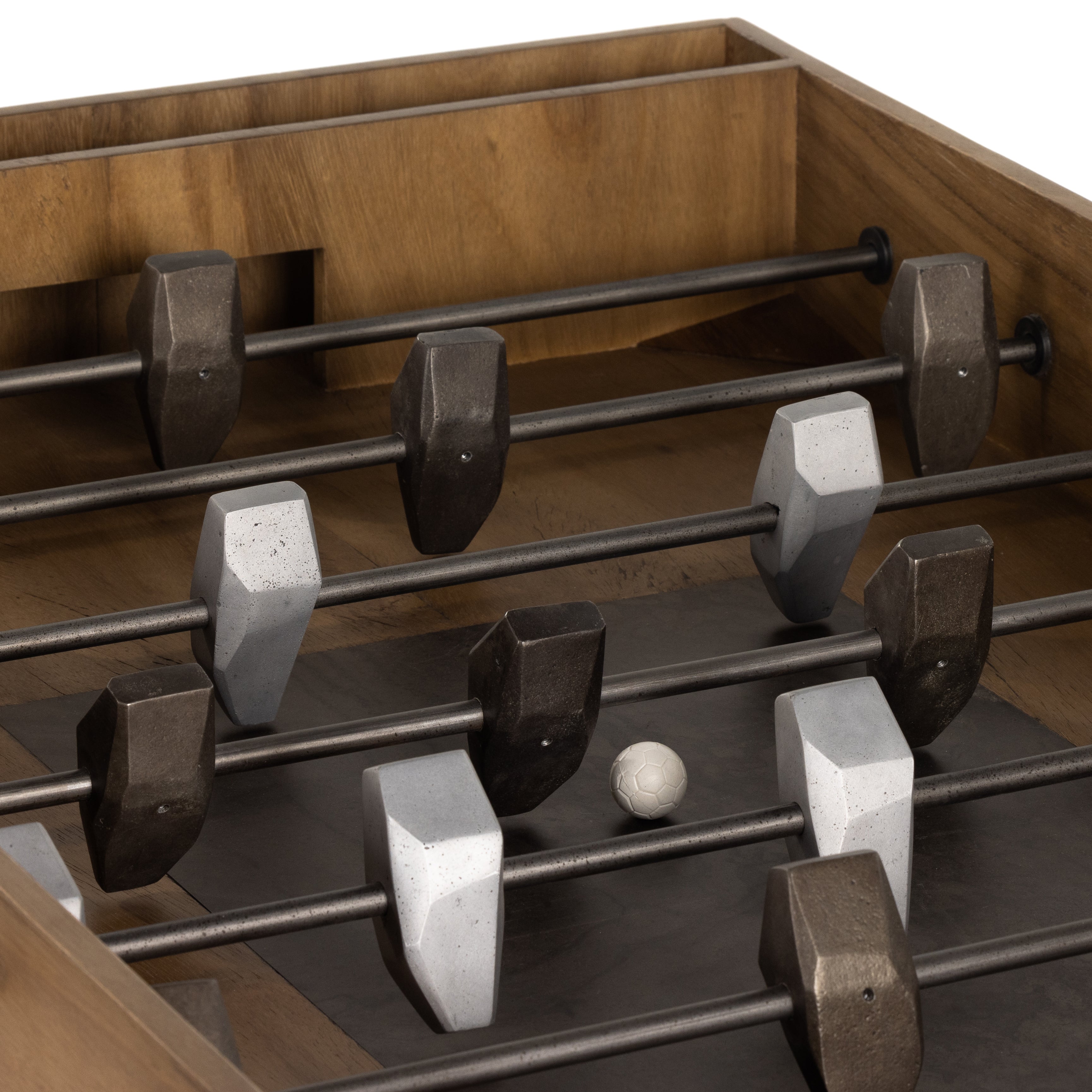 Handmade by skilled artisans, the Foosball Natural Brown Guanacaste Table is a one-of-a-kind game that features a beautiful blend of hand-finished Guanacaste wood and metal that’s been aged through a manual, month-long process using natural elements to bring unique character to each piece. Includes three balls. Amethyst Home provides interior design services, furniture, rugs, and lighting in the Kansas City metro area.