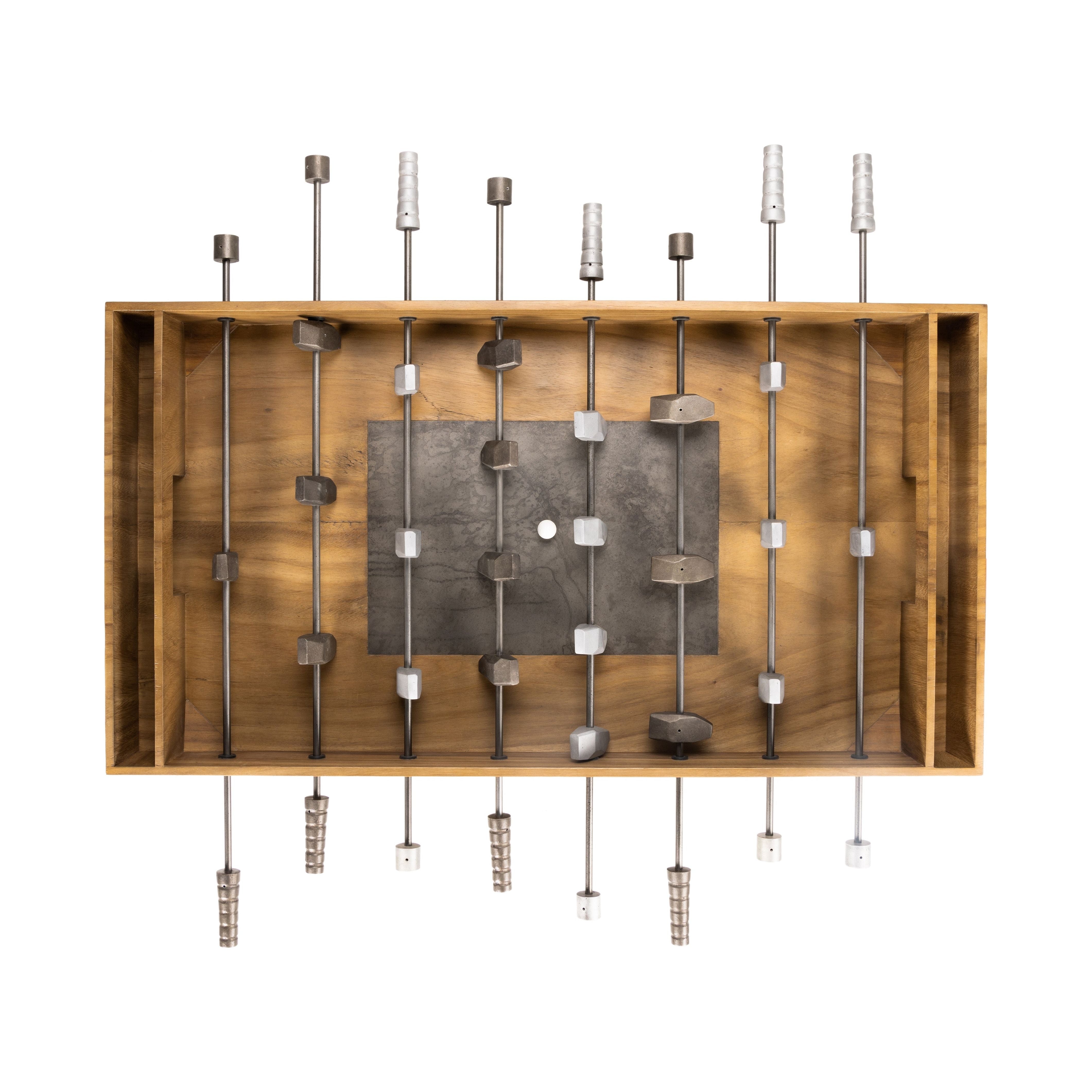 Handmade by skilled artisans, the Foosball Natural Brown Guanacaste Table is a one-of-a-kind game that features a beautiful blend of hand-finished Guanacaste wood and metal that’s been aged through a manual, month-long process using natural elements to bring unique character to each piece. Includes three balls. Amethyst Home provides interior design services, furniture, rugs, and lighting in the Los Angeles metro area.