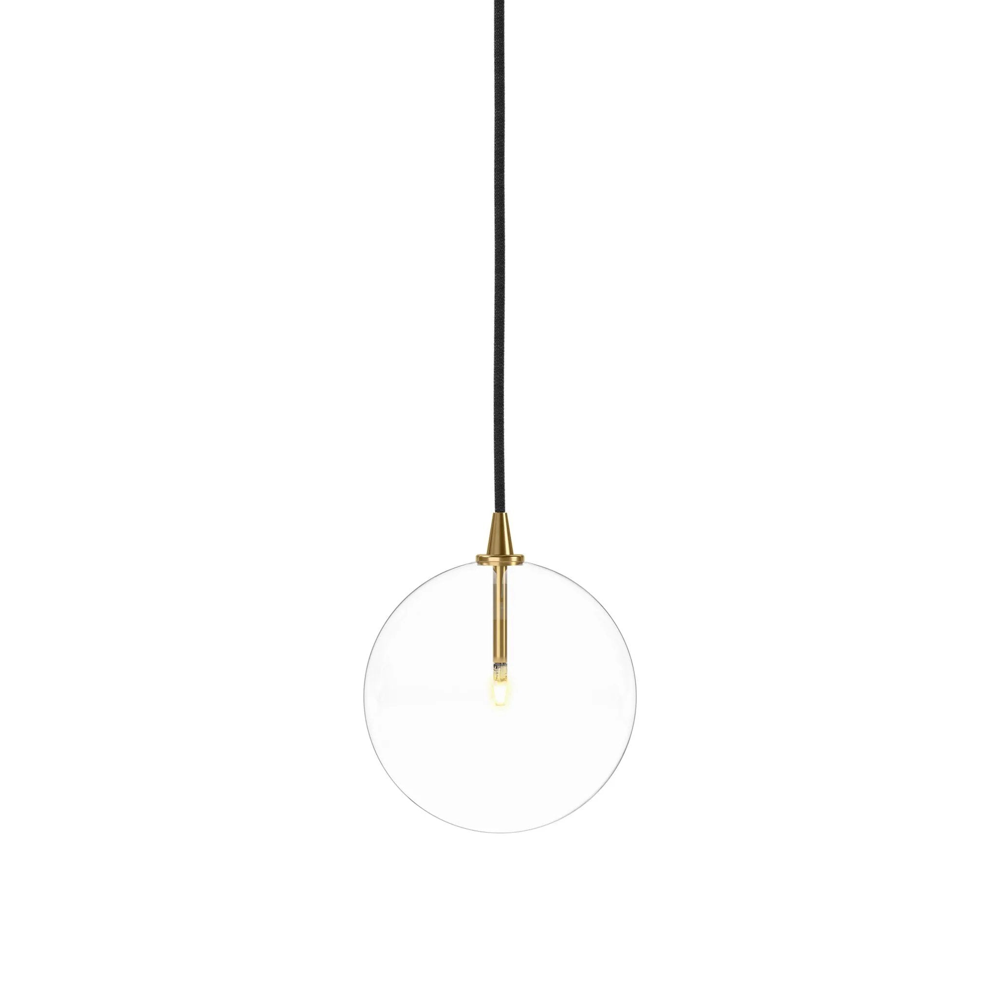 Featuring Glass Burnished Brass Clear Glass Globe Medium Pendant by Four Hands at Amethyst Home. A single glass sphere dangles for a stunning effect. Each globe is individually blown, shaped and sculpted by hand through a one-hour process. Brass and glass are 98% recyclable. Designed and sustainably crafted in Poland by Schwung.
Overall Dimensions : 7.75. Amethyst Home provides interior design, new home construction design consulting, vintage area rugs, and lighting in the Laguna Beach metro area.