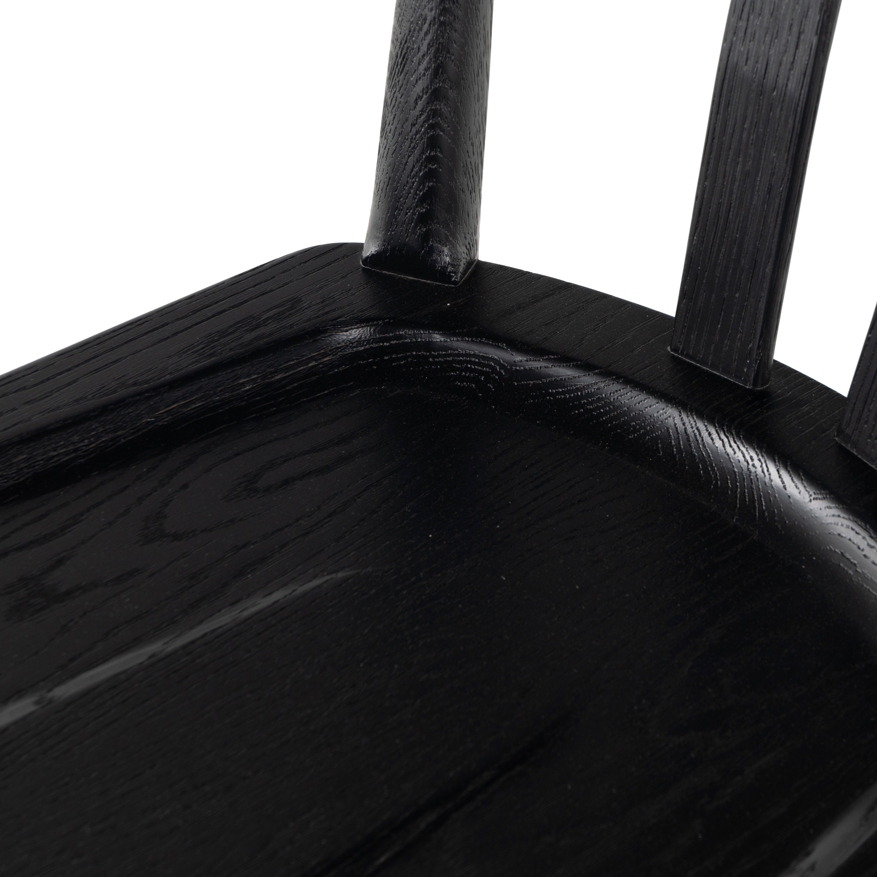 Finished in a beautifully classic black oak, the Gregory Black Oak Dining Chair features a yoke-like back and widened supports, placing a fresh twist on the traditional Windsor. Amethyst Home provides interior design, new construction, custom furniture, and rugs for the Boston metro area.