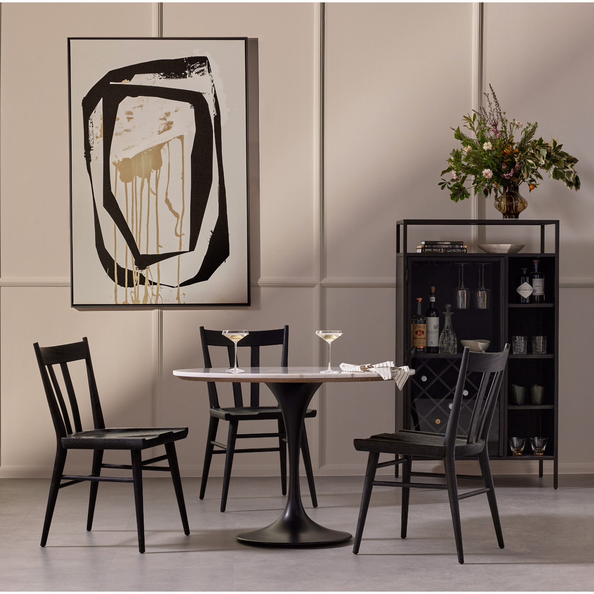 Finished in a beautifully classic black oak, the Gregory Black Oak Dining Chair features a yoke-like back and widened supports, placing a fresh twist on the traditional Windsor. Amethyst Home provides interior design, new construction, custom furniture, and rugs for the Des Moines and Cedar Rapids, Iowa metro area.