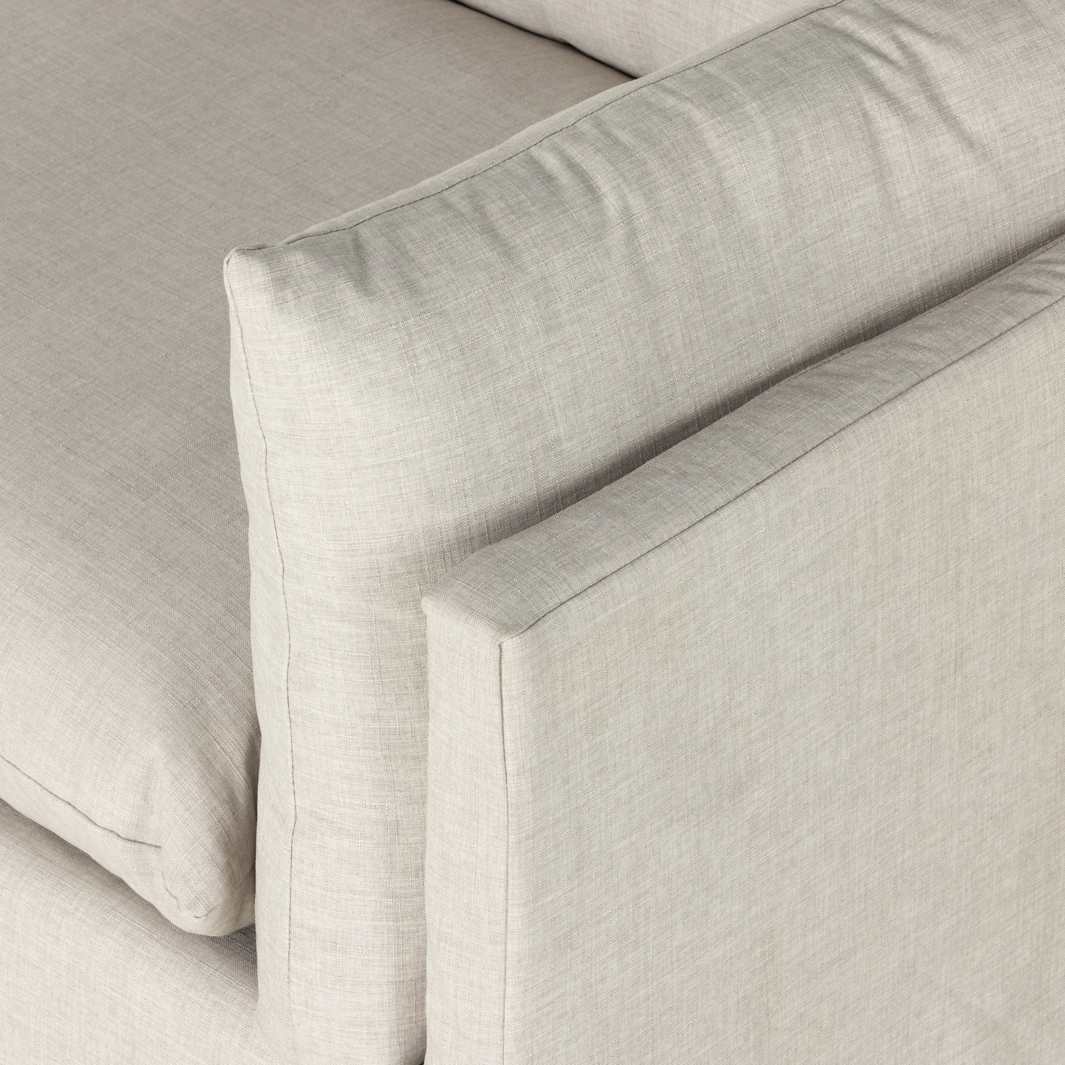 Featuring Habitat Bennett Moon Sofa by Four Hands at Amethyst Home. A slipcovered sofa made for modern living. Shelter arms and big, pillow-inspired cushions are covered in a durable, comfortable fabric prime for lounging. Performance fabrics are specially created to withstand spills, stains, high traffic and wear, ensuring long-term comfort and unmatched d. Amethyst Home provides interior design, new home construction design consulting, vintage area rugs, and lighting in the Calabasas metro area.