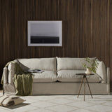Featuring Habitat Bennett Moon Sofa by Four Hands at Amethyst Home. A slipcovered sofa made for modern living. Shelter arms and big, pillow-inspired cushions are covered in a durable, comfortable fabric prime for lounging. Performance fabrics are specially created to withstand spills, stains, high traffic and wear, ensuring long-term comfort and unmatched durab. Amethyst Home provides interior design, new home construction design consulting, vintage area rugs, and lighting in the Miami metro area.