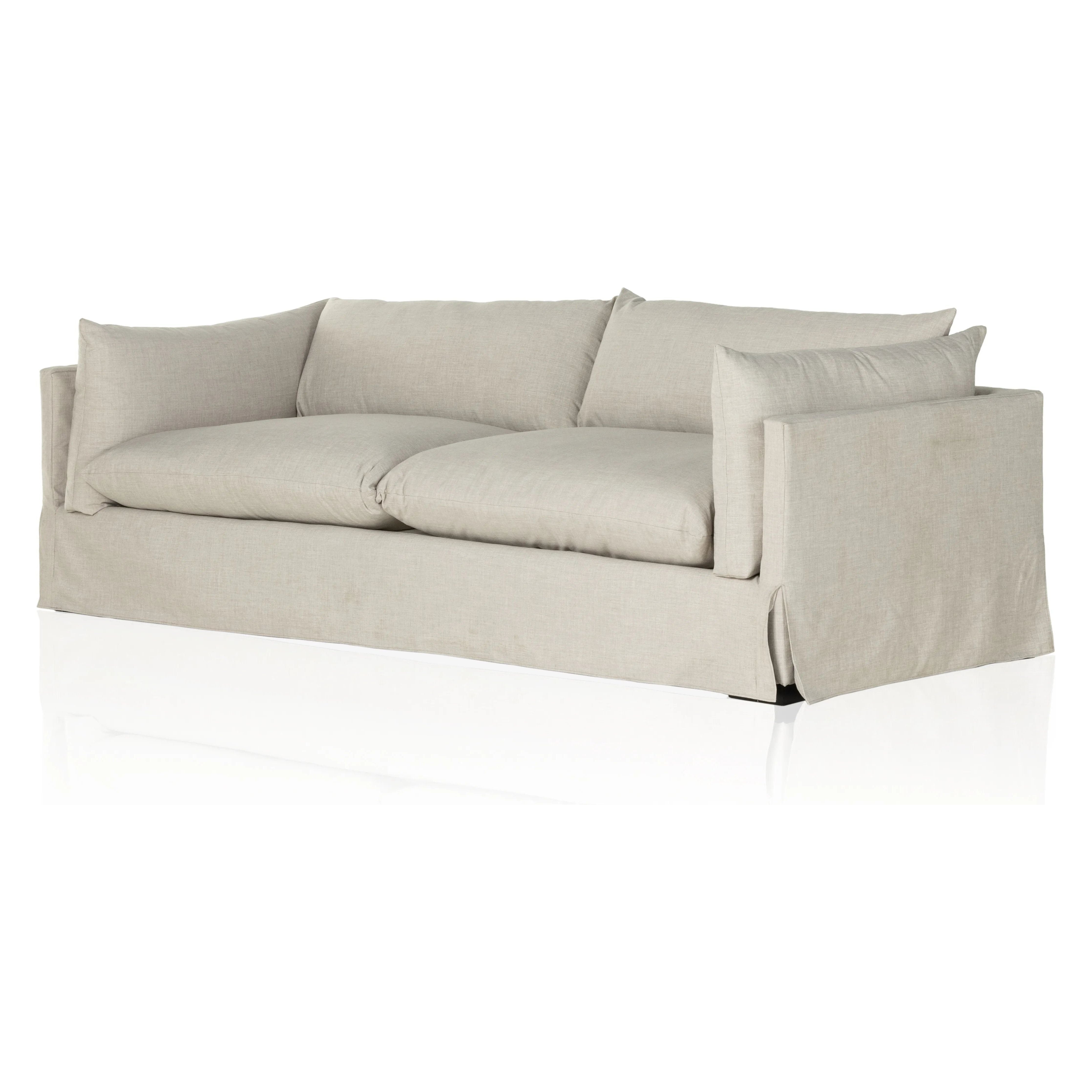 A slipcovered sofa made for modern living. Shelter arms and big, pillow-inspired cushions are covered in a durable, comfortable fabric prime for lounging. Performance fabrics are specially created to withstand spills, stains, high traffic and wear, ensuring long-term comfort and unmatched durability Amethyst Home provides interior design, new home construction design consulting, vintage area rugs, and lighting in the Omaha metro area.