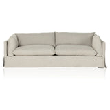 Featuring Habitat Bennett Moon Sofa by Four Hands at Amethyst Home. A slipcovered sofa made for modern living. Shelter arms and big, pillow-inspired cushions are covered in a durable, comfortable fabric prime for lounging. Performance fabrics are specially created to withstand spills, stains, high traffic and wear, ensuring long-term comfort and unmatched du. Amethyst Home provides interior design, new home construction design consulting, vintage area rugs, and lighting in the Portland metro area.