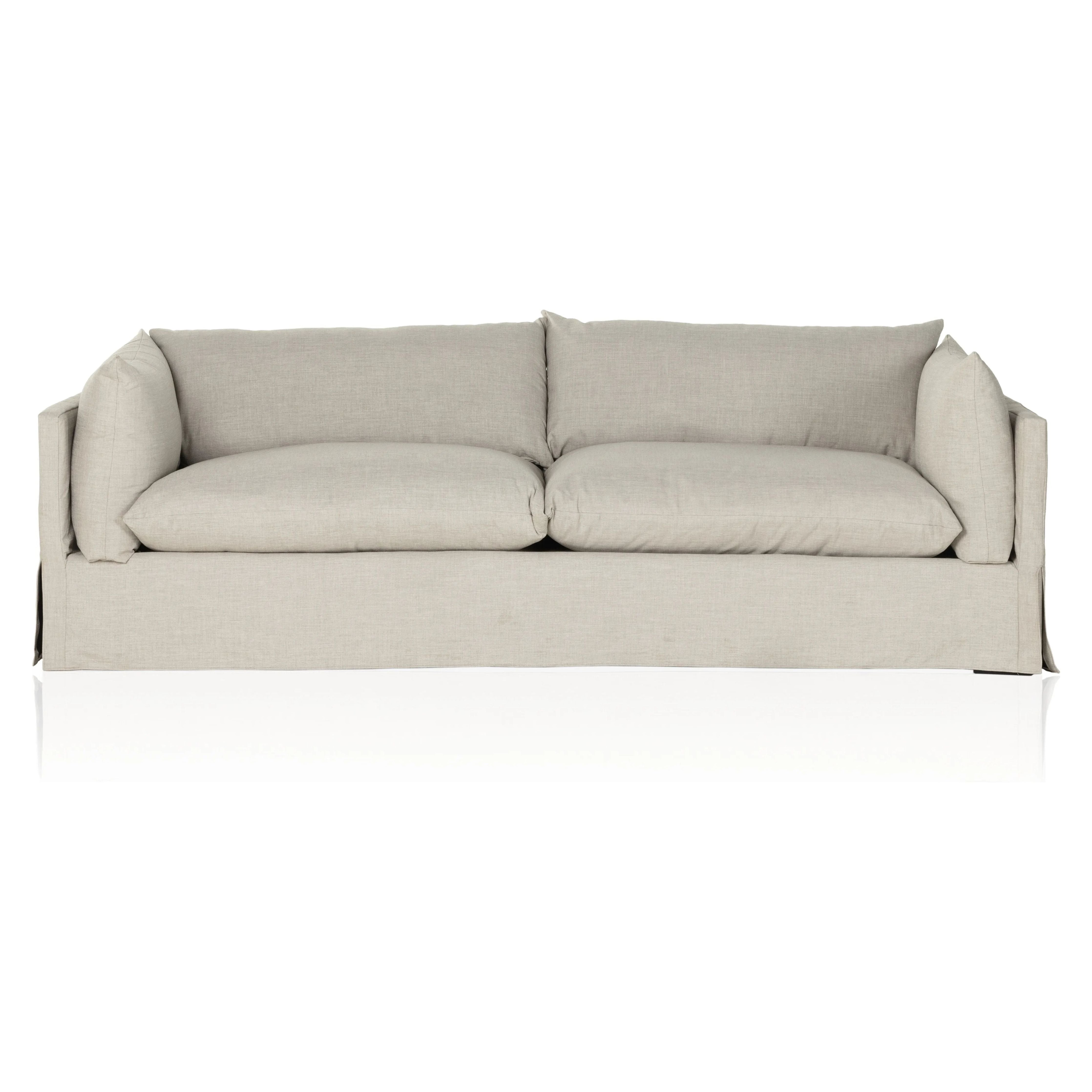 Featuring Habitat Bennett Moon Sofa by Four Hands at Amethyst Home. A slipcovered sofa made for modern living. Shelter arms and big, pillow-inspired cushions are covered in a durable, comfortable fabric prime for lounging. Performance fabrics are specially created to withstand spills, stains, high traffic and wear, ensuring long-term comfort and unmatched du. Amethyst Home provides interior design, new home construction design consulting, vintage area rugs, and lighting in the Portland metro area.