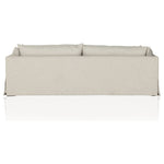 Featuring Habitat Bennett Moon Sofa by Four Hands at Amethyst Home. A slipcovered sofa made for modern living. Shelter arms and big, pillow-inspired cushions are covered in a durable, comfortable fabric prime for lounging. Performance fabrics are specially created to withstand spills, stains, high traffic and wear, ensuring long-term comfort and unmatched dur. Amethyst Home provides interior design, new home construction design consulting, vintage area rugs, and lighting in the Seattle metro area.