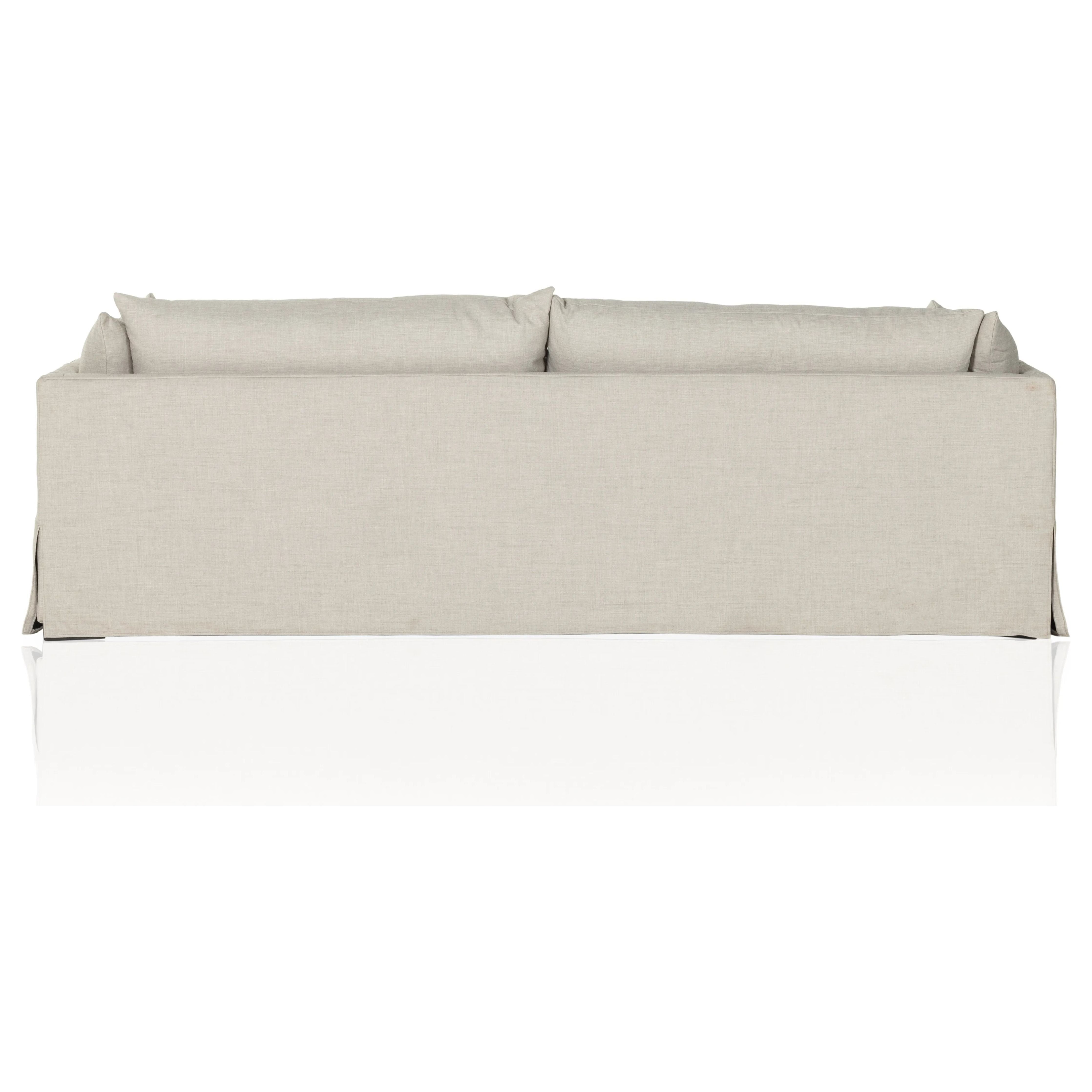 Featuring Habitat Bennett Moon Sofa by Four Hands at Amethyst Home. A slipcovered sofa made for modern living. Shelter arms and big, pillow-inspired cushions are covered in a durable, comfortable fabric prime for lounging. Performance fabrics are specially created to withstand spills, stains, high traffic and wear, ensuring long-term comfort and unmatched dur. Amethyst Home provides interior design, new home construction design consulting, vintage area rugs, and lighting in the Seattle metro area.