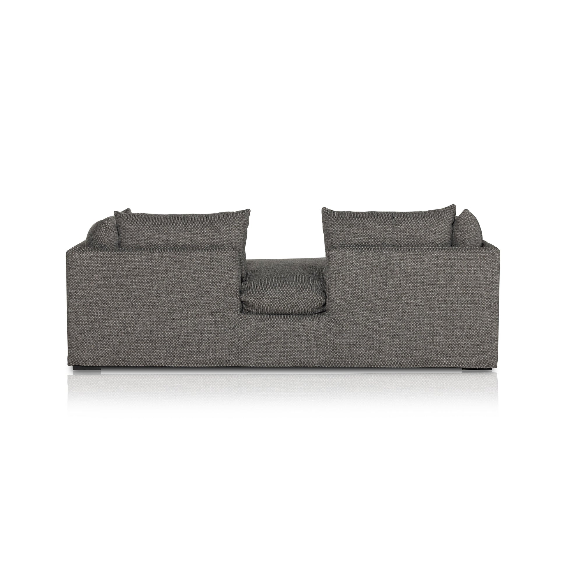 Chaise-style lounging, made for modern living. Neutral-toned upholstery covers shelter arms and oversize pillow-inspired cushion. Performance fabrics are specially created to withstand spills, stains, high traffic and wear, ensuring long-term comfort and unmatched durability. Amethyst Home provides interior design, new home construction design consulting, vintage area rugs, and lighting in the Boston metro area.