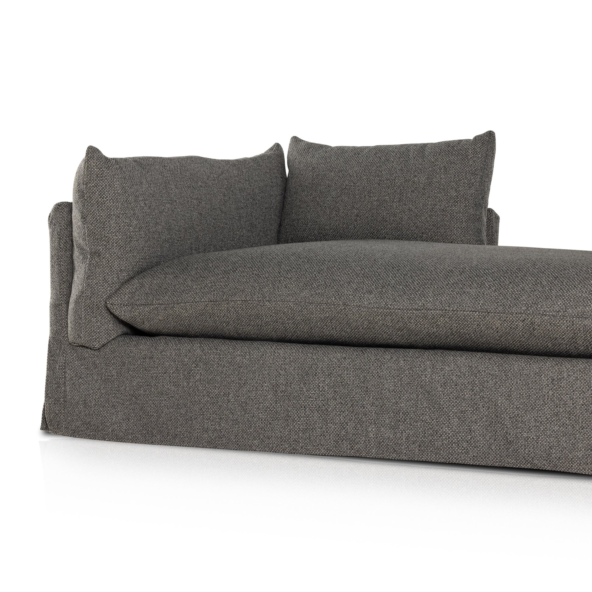 Chaise-style lounging, made for modern living. Neutral-toned upholstery covers shelter arms and oversize pillow-inspired cushion. Performance fabrics are specially created to withstand spills, stains, high traffic and wear, ensuring long-term comfort and unmatched durability. Amethyst Home provides interior design, new home construction design consulting, vintage area rugs, and lighting in the Charlotte metro area.