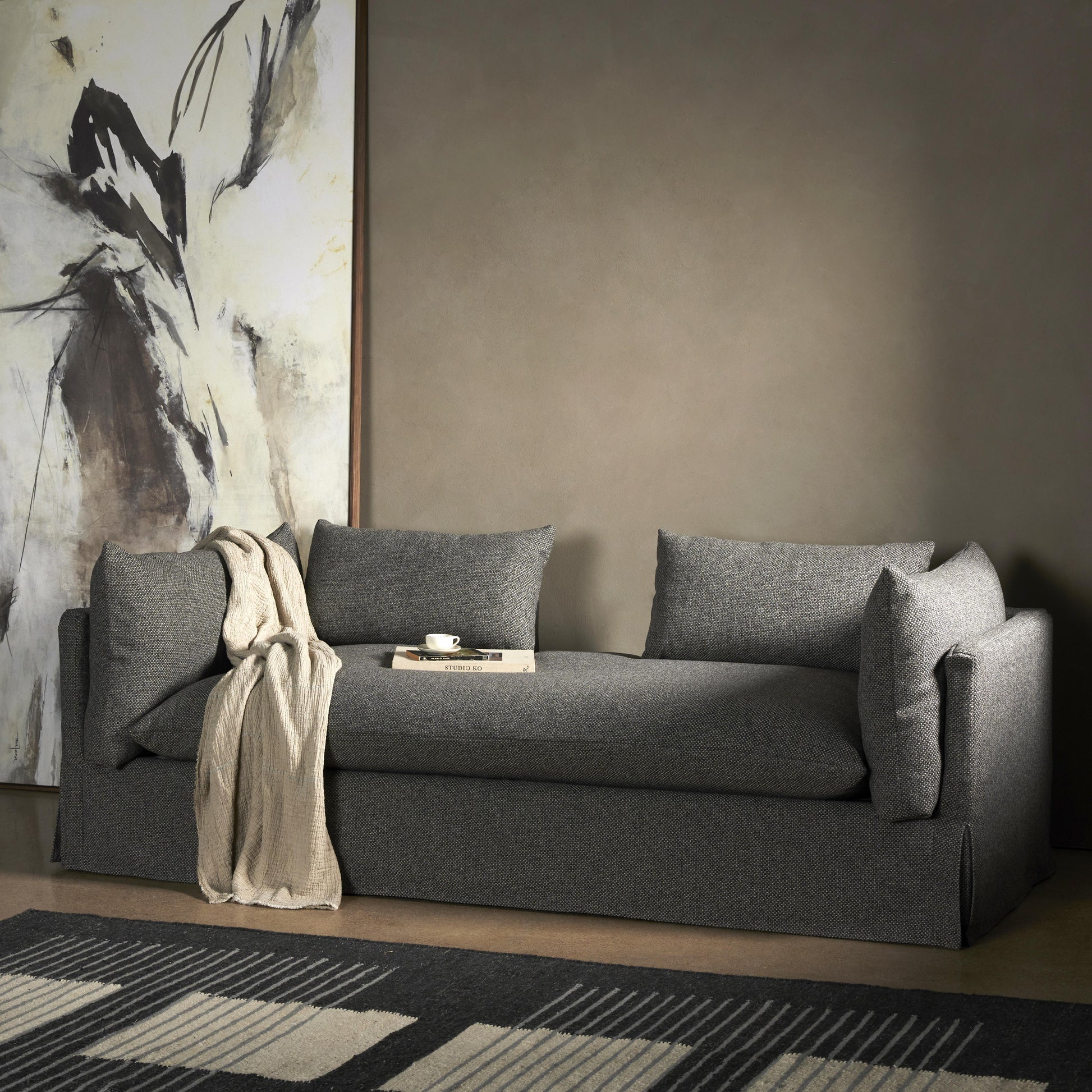 Chaise-style lounging, made for modern living. Neutral-toned upholstery covers shelter arms and oversize pillow-inspired cushion. Performance fabrics are specially created to withstand spills, stains, high traffic and wear, ensuring long-term comfort and unmatched durability. Amethyst Home provides interior design, new home construction design consulting, vintage area rugs, and lighting in the Des Moines metro area.