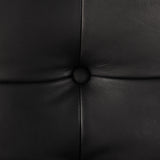 A Seventies-era style inspired by a flea market find, a dramatically tufted sling seat of black top-grain leather angles at the just-right pitch for total comfort, with wide, brown ash framing. Amethyst Home provides interior design, new home construction design consulting, vintage area rugs, and lighting in the Alpharetta metro area.