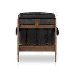 A Seventies-era style inspired by a flea market find, a dramatically tufted sling seat of black top-grain leather angles at the just-right pitch for total comfort, with wide, brown ash framing. Amethyst Home provides interior design, new home construction design consulting, vintage area rugs, and lighting in the Tampa metro area.