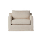 Featuring Hampton Creme Slipcover Swivel Chair by Four Hands at Amethyst Home. Proudly built by American makers using US-sourced materials and mechanisms. This classic swivel chair features clean track arms, a high, supportive back, feather filling and a 360-degree swivel. Upholstered with a fully removable slipcover of PFAS-free performance fabric that can b. Amethyst Home provides interior design, new home construction design consulting, vintage area rugs, and lighting in the Houston metro area.