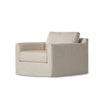 Featuring Hampton Creme Slipcover Swivel Chair by Four Hands at Amethyst Home. Proudly built by American makers using US-sourced materials and mechanisms. This classic swivel chair features clean track arms, a high, supportive back, feather filling and a 360-degree swivel. Upholstered with a fully removable slipcover of PFAS-free performance fabric that can be . Amethyst Home provides interior design, new home construction design consulting, vintage area rugs, and lighting in the Omaha metro area.