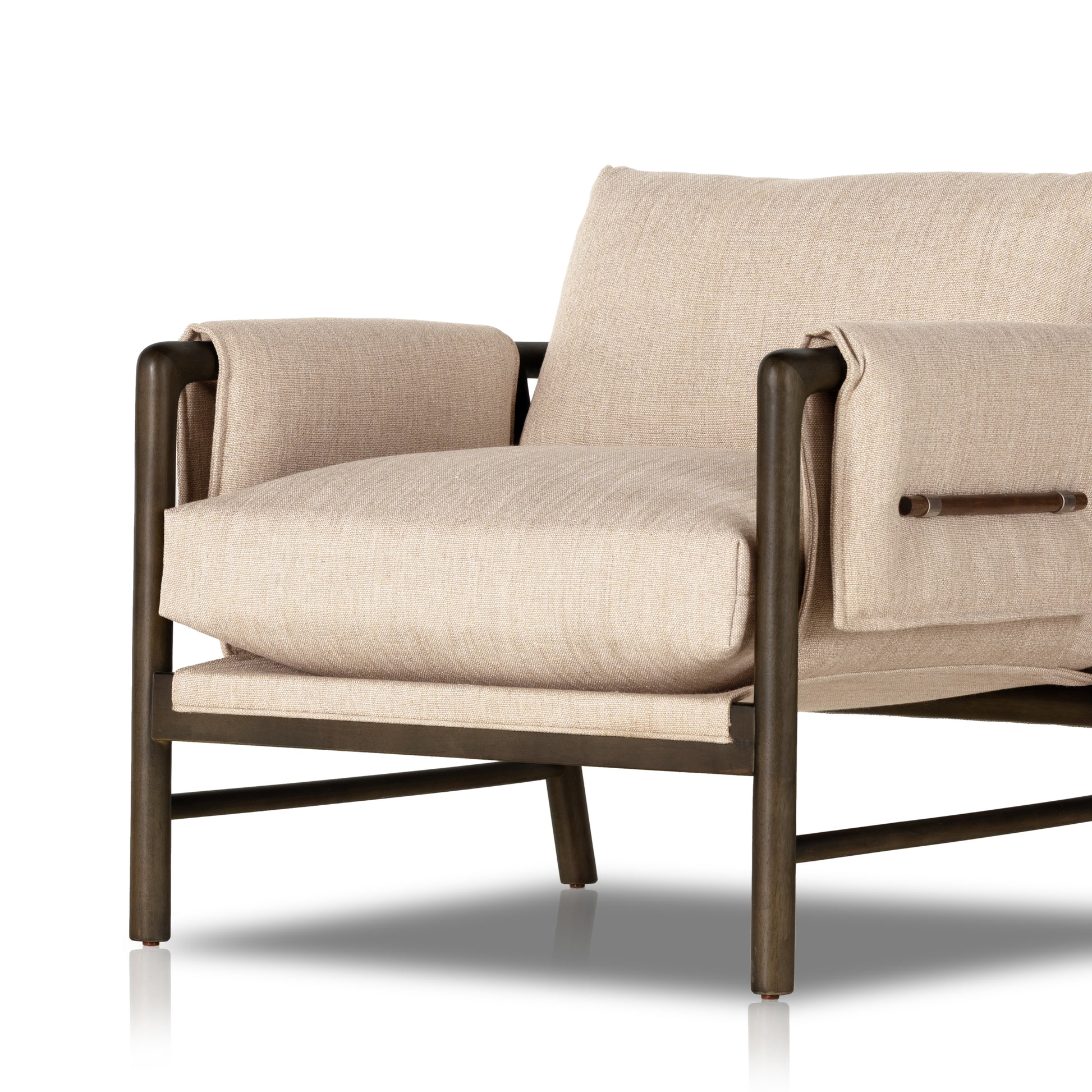 Details make the chair. With poly-blend performance fabric that wraps each arm, faux toggles add an element of interest to midcentury-inspired seating in a wheat hue, with softly sculpted parawood framing carrying out a beautiful neutral look. Amethyst Home provides interior design, new construction, custom furniture, and area rugs in the Alpharetta metro area.