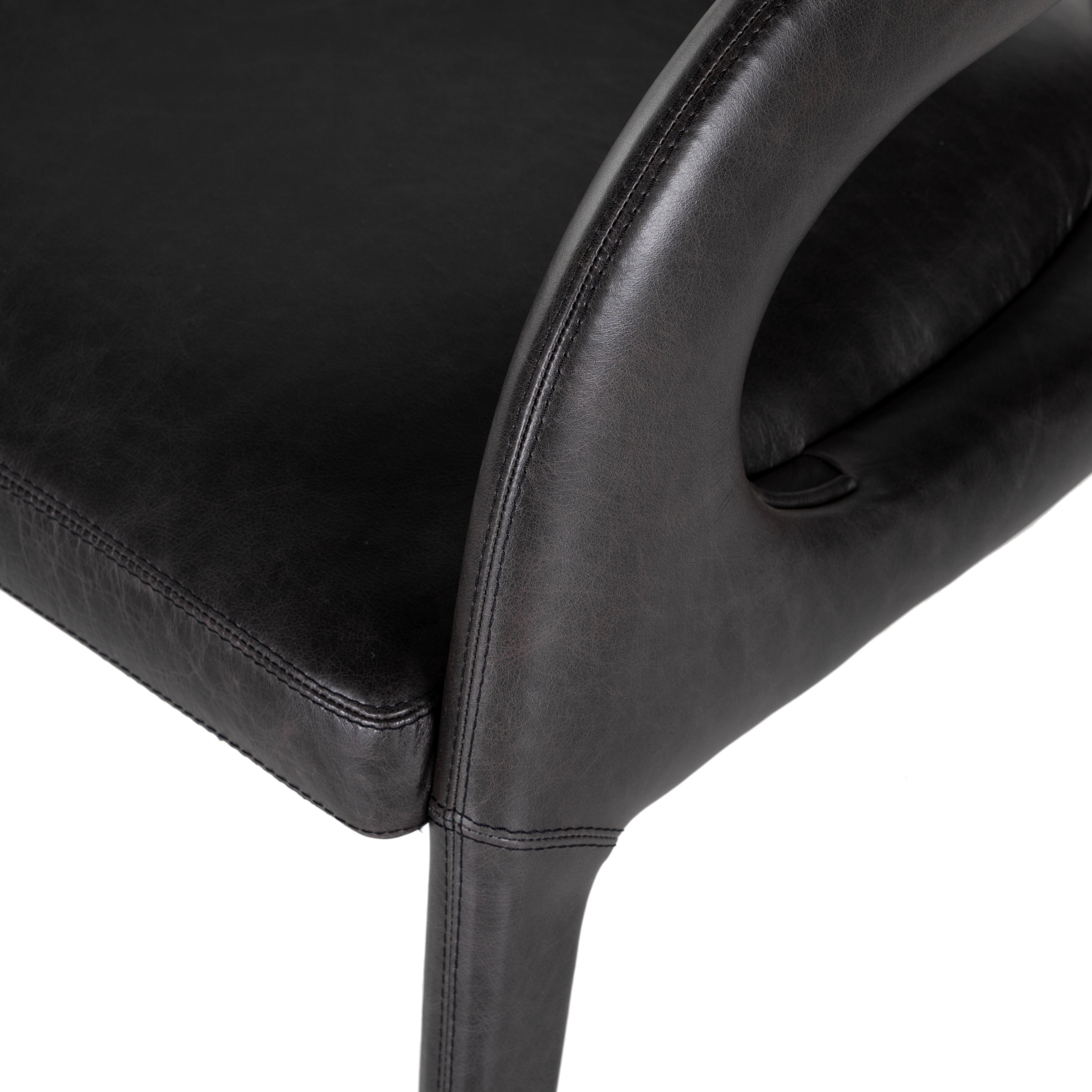 Strike a pose. Well curved and finely sculpted, black top-grain leather exclusive to Four Hands makes a uniquely shapely statement in any room. Amethyst Home provides interior design, new construction, custom furniture, and area rugs in the Austin metro area.