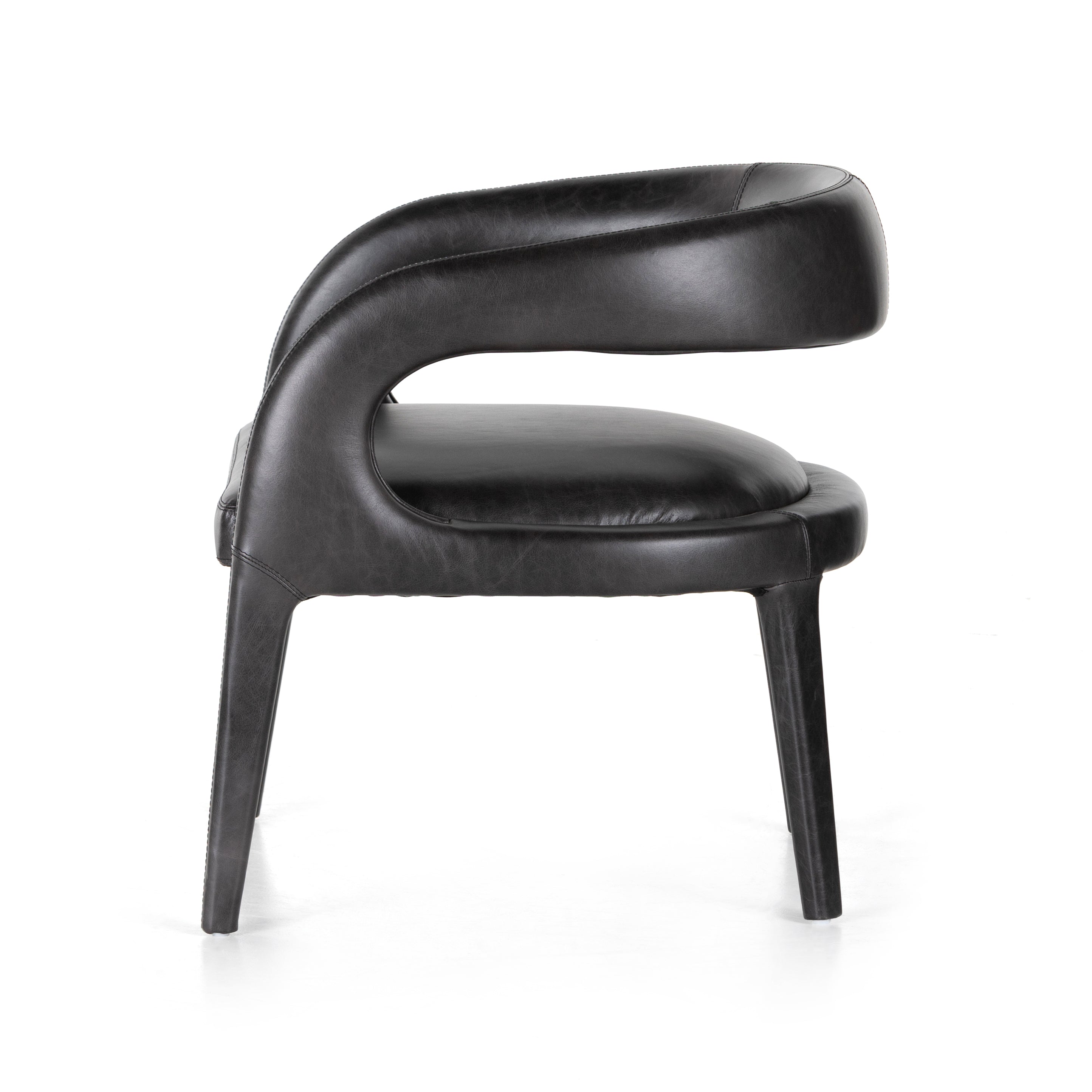 Strike a pose. Well curved and finely sculpted, black top-grain leather exclusive to Four Hands makes a uniquely shapely statement in any room. Amethyst Home provides interior design, new construction, custom furniture, and area rugs in the Laguna Beach metro area.