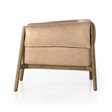 Sink right in. With slightly splayed legs for subtle intrigue, a tawny oak frame cradles comfy seating of top-grain leather in a nude hue, with wrapped arms for a cushioned look and feel. Amethyst Home provides interior design, new construction, custom furniture, and area rugs in the Monterey metro area.