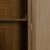 Ilana Burnished Mindi Cabinet forms a dramatic arch this glass-front cabinetry, with woven natural cane backing for a textural finishing touch. Amethyst Home provides interior design services, furniture, rugs, and lighting in the Kansas City metro area.