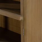 Ilana Burnished Mindi Cabinet forms a dramatic arch this glass-front cabinetry, with woven natural cane backing for a textural finishing touch. Amethyst Home provides interior design services, furniture, rugs, and lighting in the Salt Lake City metro area.