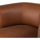 A 60s-era design is re-envisioned with an exposed parawood frame, thick-cut Brazilian leather and overinflated arms that provide cushion all around. Designed with an extra-thick seat cushioning with S spring construction for a plush, supportive sit. Amethyst Home provides interior design, new construction, custom furniture, and area rugs in the Tampa metro area.