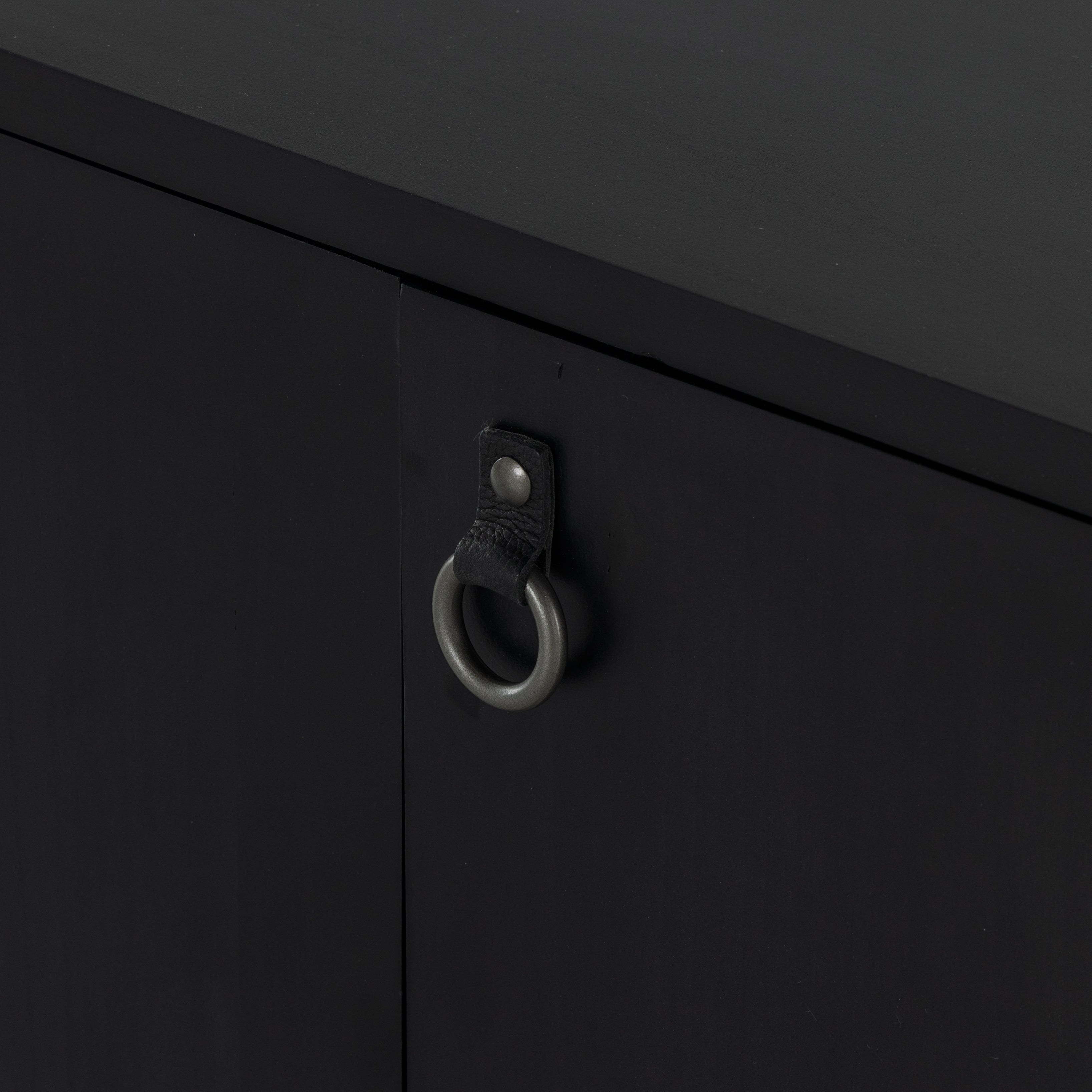Beautifully simple in spirit. Black-washed dry poplar forms a clean-lined media console with faux dovetail joinery plus iron and leather hardware, for a material-driven update to Shaker-inspired styling. Rear cutouts for cord management. Amethyst Home provides interior design, new construction, custom furniture, and area rugs in the Miami metro area.