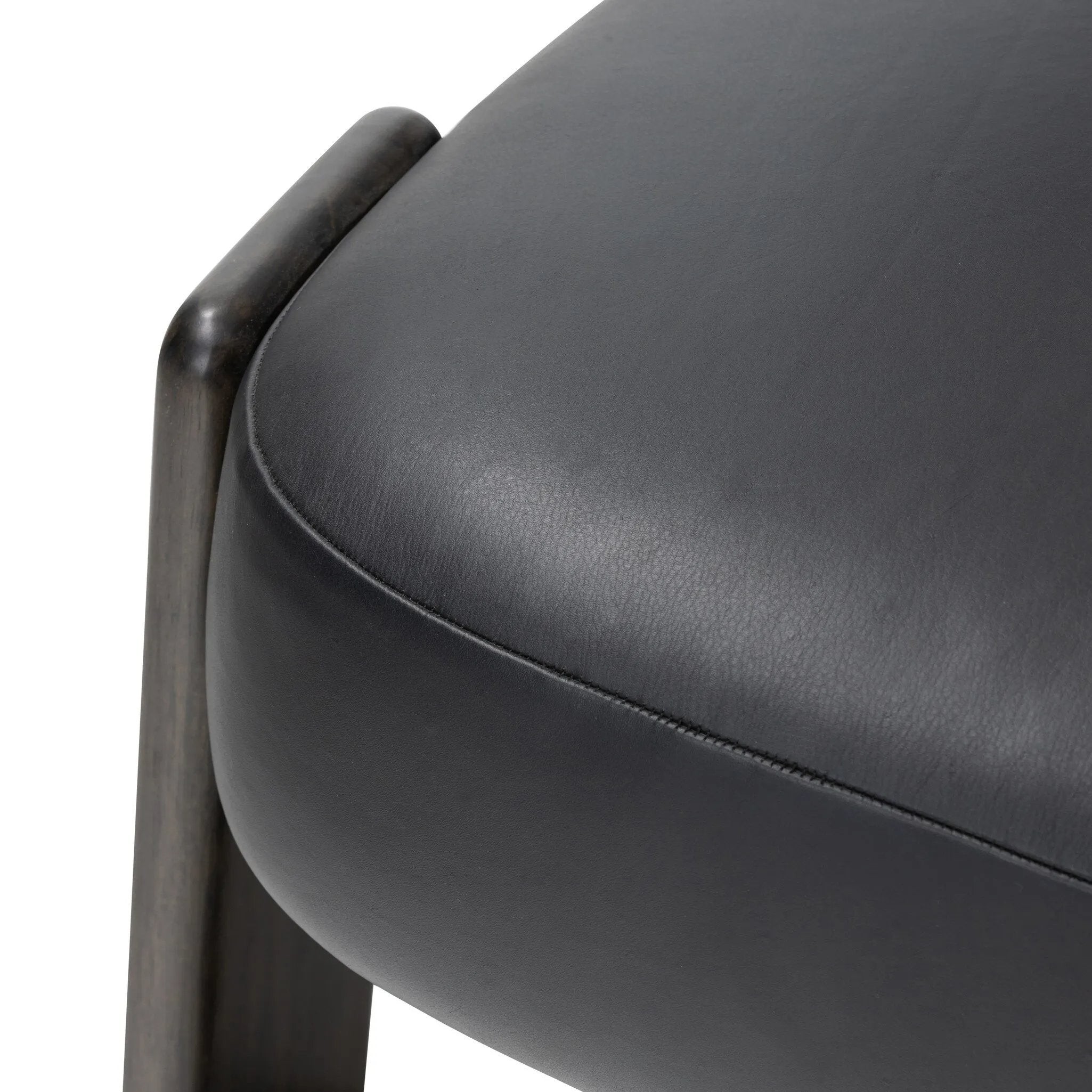 Featuring Issa Carson Black Accent Chair by Four Hands at Amethyst Home. This polished tri-leg chair features a "floating" seat cushion that has been constructed with spring suspension and a seemingly invisible connection to the legs. With a seat of black top-grain leather and a wooden frame, the chair evokes monochromatic chic.
Collection: FarrowColors: Carson. Amethyst Home provides interior design, new home construction design consulting, vintage area rugs, and lighting in the Tampa metro area.