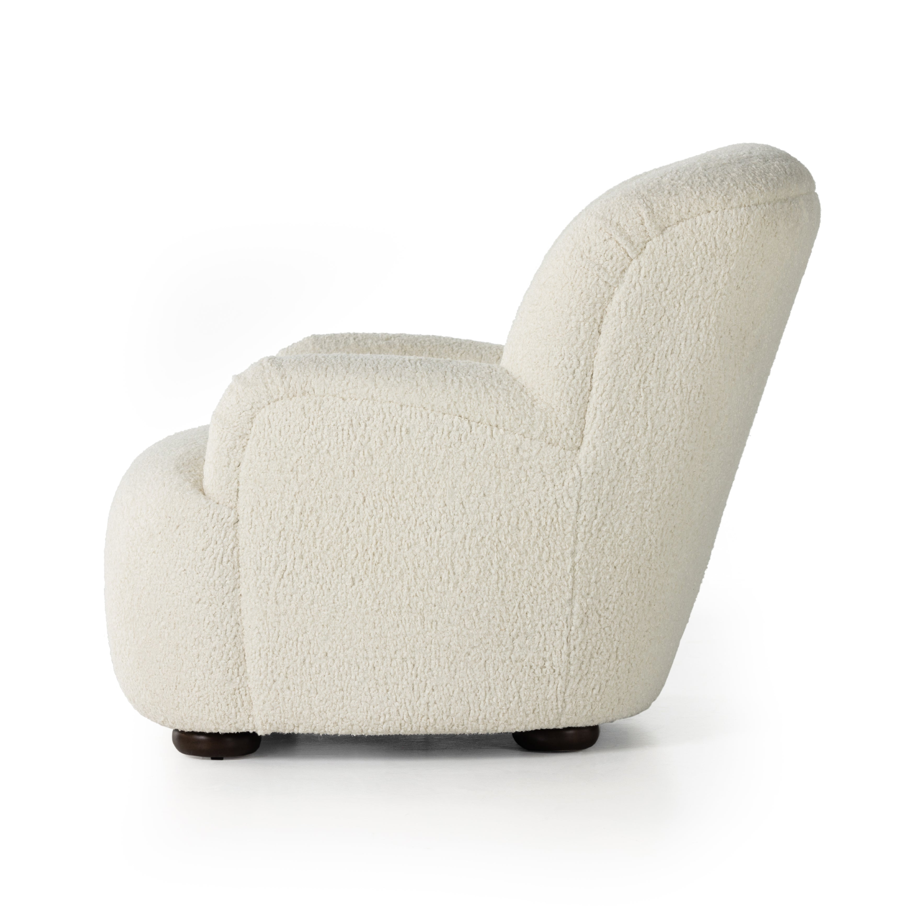 Kadon Sheepskin Natural Chair's high wing back pairs with softly rolled arms for a curvy look and supportive sit. Cream shearling-like upholstery invites you to sit and stay a while Amethyst Home provides interior design services, furniture, rugs, and lighting in the Los Angeles metro area.