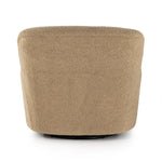 Simply classic. The Kadon Swivel Chair features a high wing back and pairs with softly rolled arms for a curvy look and supportive sit. Camel-colored shearling-upholstered seating tops a 360-degree swivel for total modernity. Amethyst Home provides interior design, new home construction design consulting, vintage area rugs, and lighting in the Des Moines metro area.