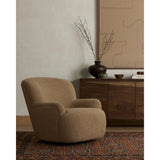 Simply classic. The Kadon Swivel Chair features a high wing back and pairs with softly rolled arms for a curvy look and supportive sit. Camel-colored shearling-upholstered seating tops a 360-degree swivel for total modernity. Amethyst Home provides interior design, new home construction design consulting, vintage area rugs, and lighting in the Nashville metro area.