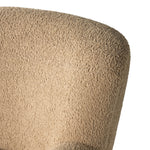 Simply classic. The Kadon Swivel Chair features a high wing back and pairs with softly rolled arms for a curvy look and supportive sit. Camel-colored shearling-upholstered seating tops a 360-degree swivel for total modernity. Amethyst Home provides interior design, new home construction design consulting, vintage area rugs, and lighting in the Tampa metro area.
