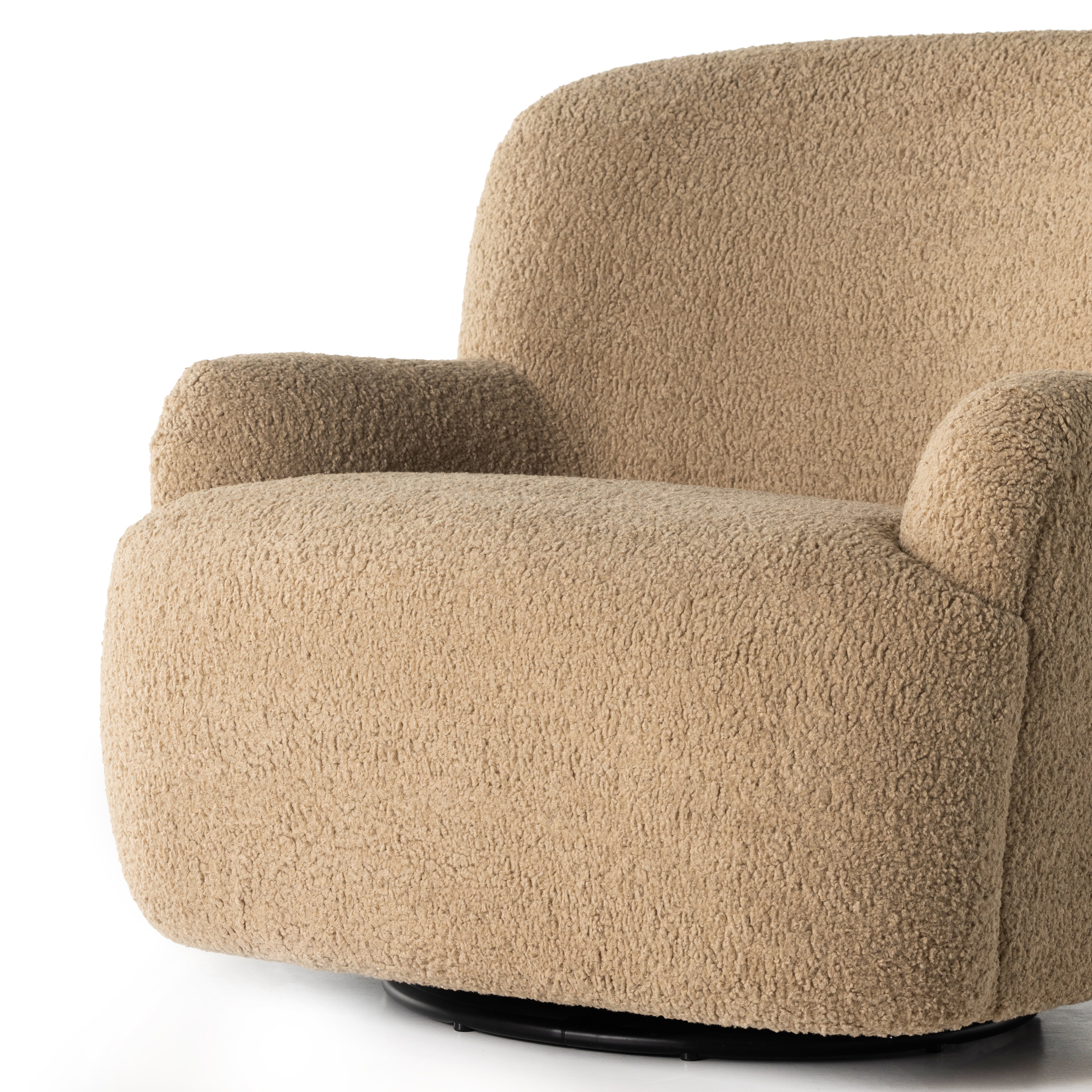 Simply classic. The Kadon Swivel Chair features a high wing back and pairs with softly rolled arms for a curvy look and supportive sit. Camel-colored shearling-upholstered seating tops a 360-degree swivel for total modernity. Amethyst Home provides interior design, new home construction design consulting, vintage area rugs, and lighting in the Laguna Beach metro area.