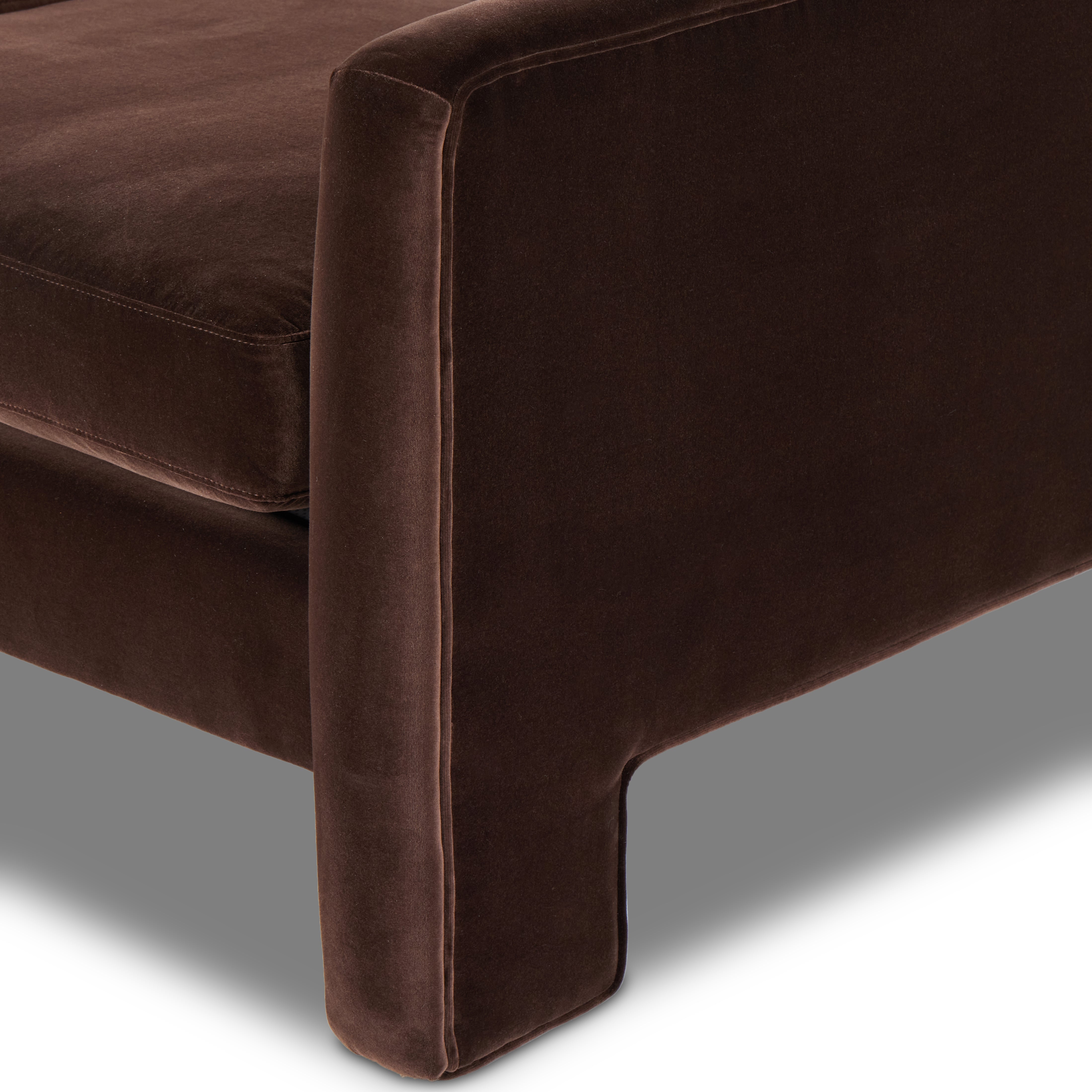 Featuring Katya Surrey Cocoa Sofa by Four Hands at Amethyst Home. Float-style this unique sofa in a room to show off design details like sleek lines and rear cutouts. Designed with S spring construction, foam and fiber seat cushioning and loose feather-blend back cushions. Upholstered in a soft, velvety cotton in a rich chocolate brown.Overall Dimensions: 96.50"W x 39.75"L x 33". Amethyst Home provides interior design, new construction, custom furniture, and area rugs in the Alpharetta metro area.