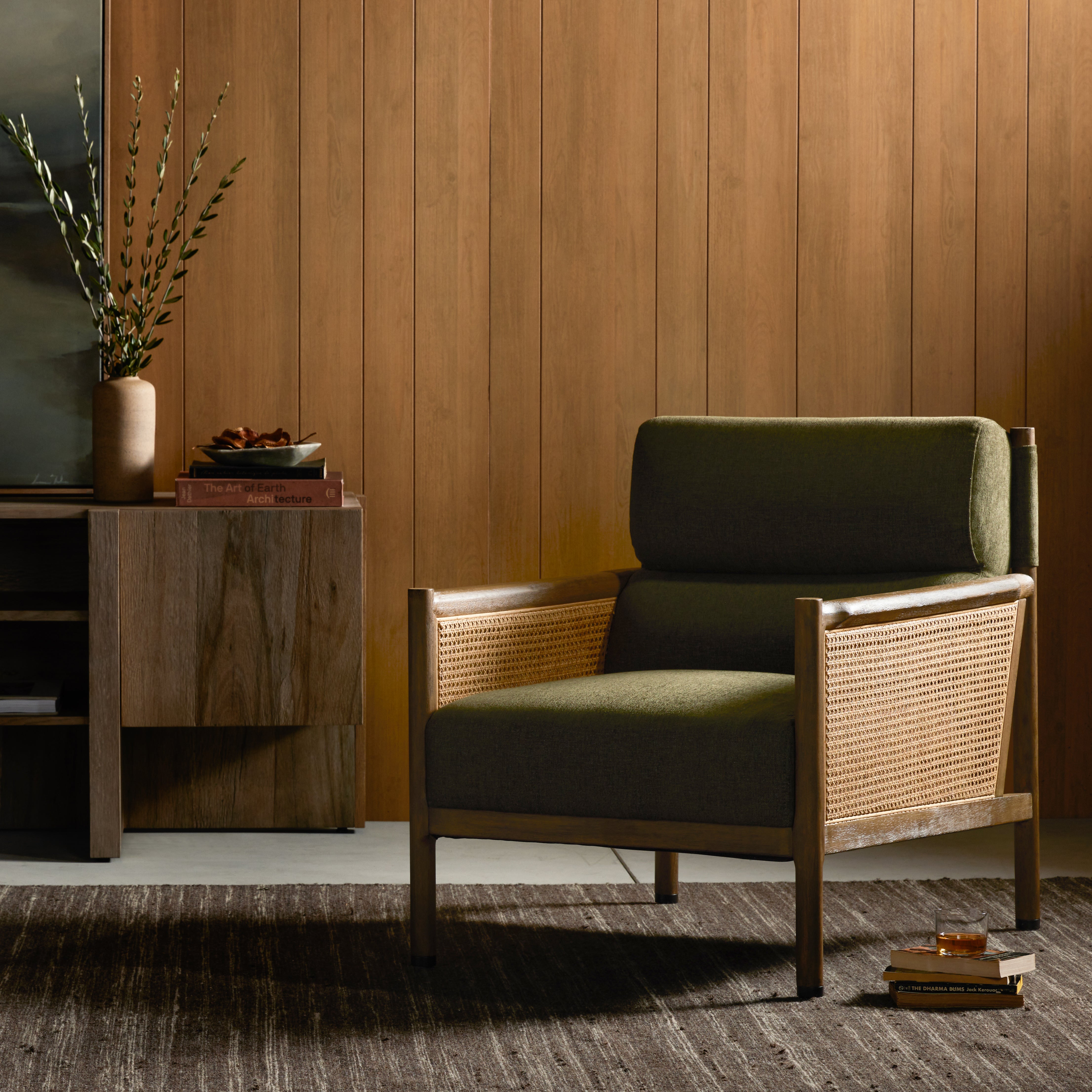 Craft a Parisian air with French-inspired seating. With a chenille-like texture and earthy olive hue, high performance-upholstered seating is perfectly positioned for comfort, with parawood framing and woven sides of natural cane. Performance fabrics are specially created to withstand spills, stains, high traffic and wear, ensuring long-term comfort and unmatched durability. Amethyst Home provides interior design, new construction, custom furniture and area rugs in the Miami metro area