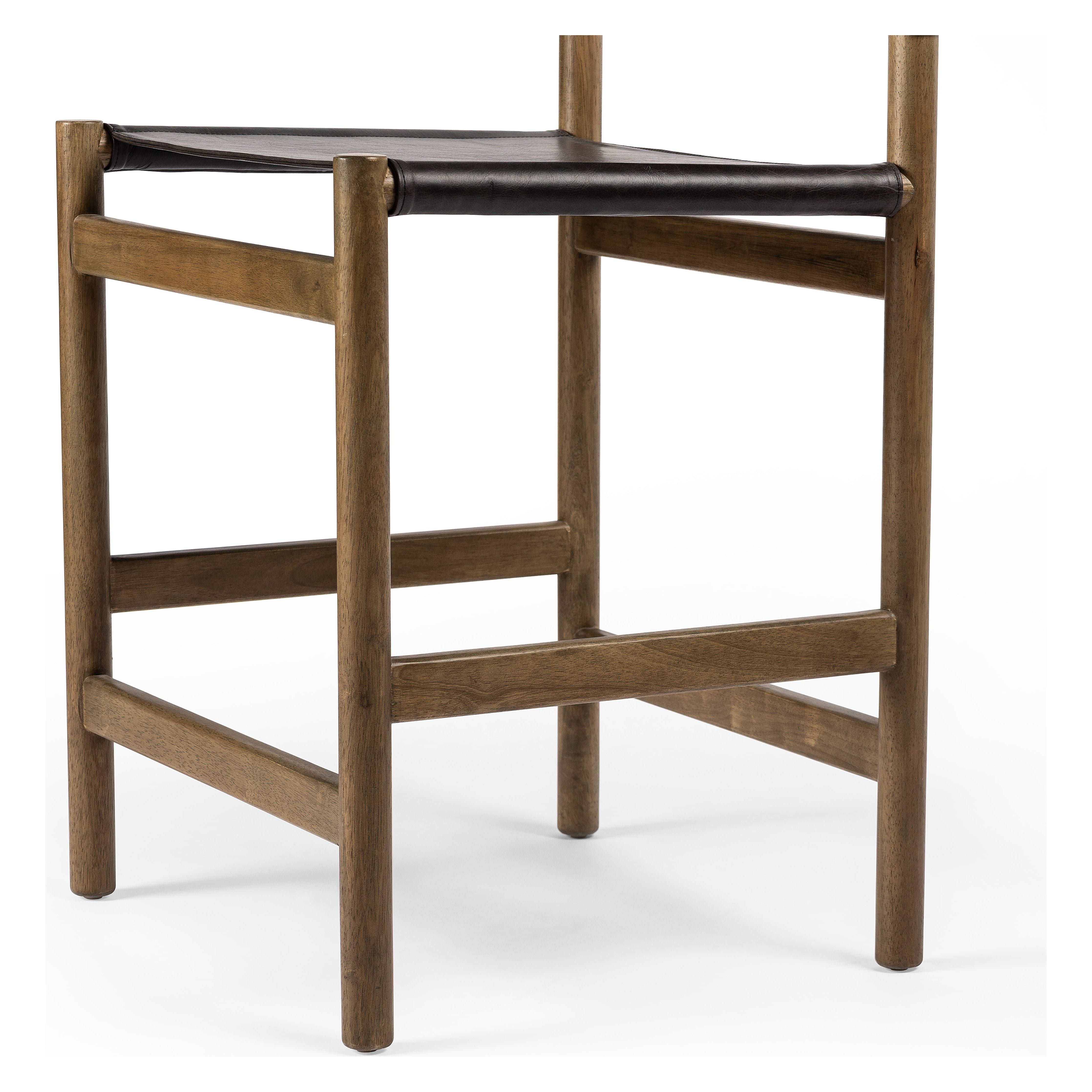 Solid parawood forms a simple, vintage-inspired frame for sling-style seating of black top-grain leather exclusive to Four Hands. Perfectly sized for the counter. Amethyst Home provides interior design, new construction, custom furniture, and area rugs in the Alpharetta metro area.