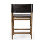 Solid parawood forms a simple, vintage-inspired frame for sling-style seating of black top-grain leather exclusive to Four Hands. Perfectly sized for the counter. Amethyst Home provides interior design, new construction, custom furniture, and area rugs in the Austin metro area.