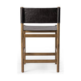 Solid parawood forms a simple, vintage-inspired frame for sling-style seating of black top-grain leather exclusive to Four Hands. Perfectly sized for the counter. Amethyst Home provides interior design, new construction, custom furniture, and area rugs in the Austin metro area.