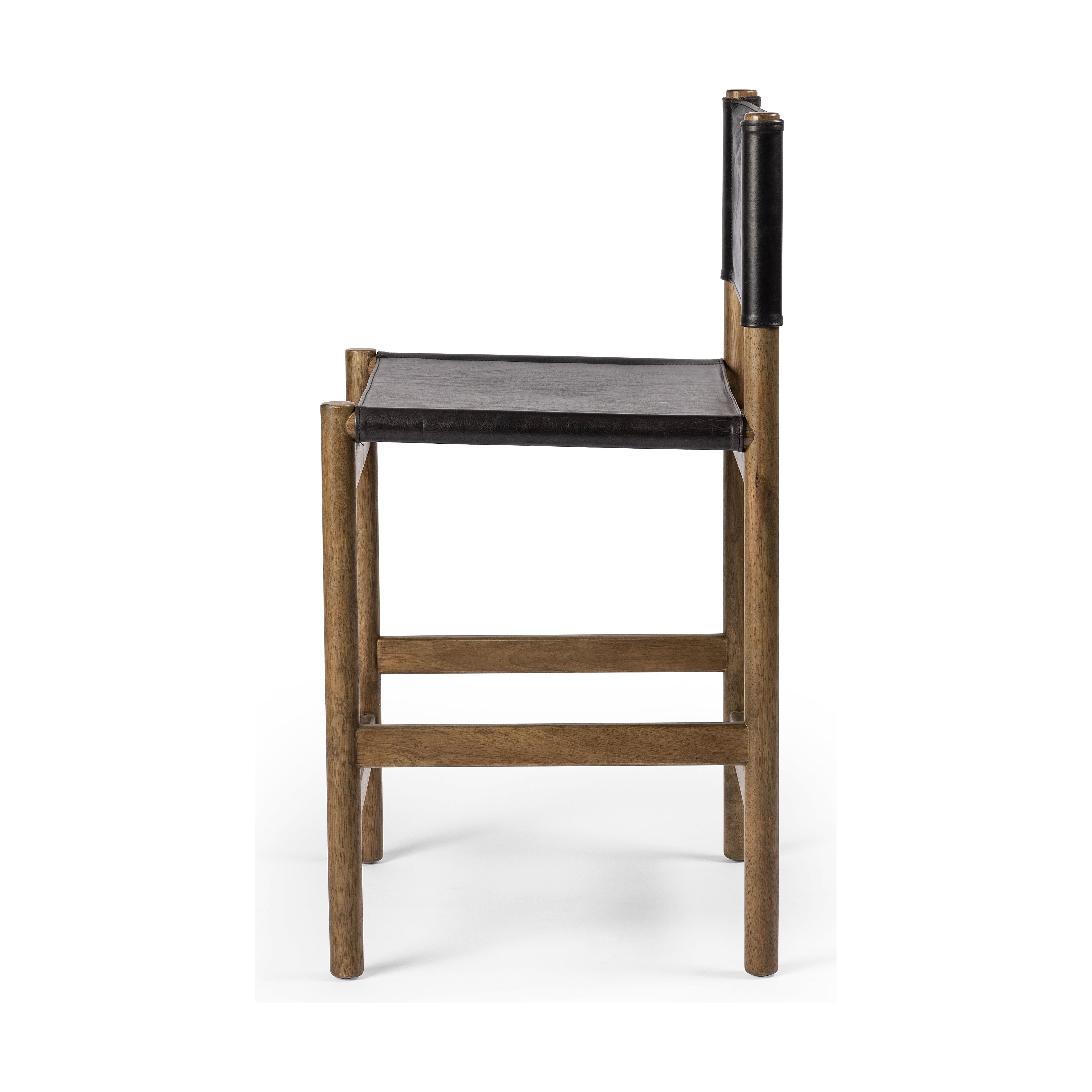 Solid parawood forms a simple, vintage-inspired frame for sling-style seating of black top-grain leather exclusive to Four Hands. Perfectly sized for the counter. Amethyst Home provides interior design, new construction, custom furniture, and area rugs in the Calabasas metro area.
