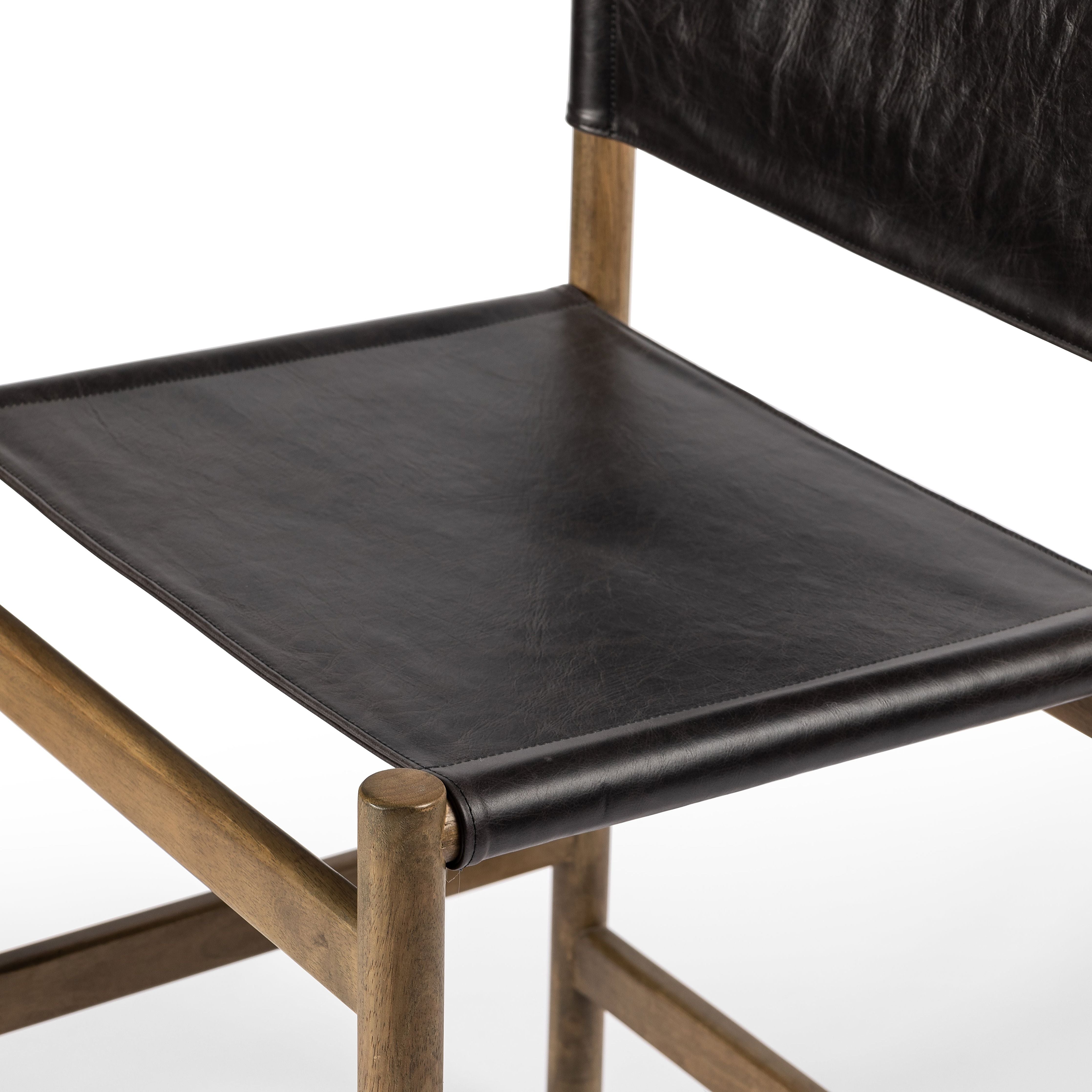 Solid parawood forms a simple, vintage-inspired frame for sling-style seating of black top-grain leather exclusive to Four Hands. Perfectly sized for the counter. Amethyst Home provides interior design, new construction, custom furniture, and area rugs in the Kansas City metro area.