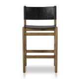Solid parawood forms a simple, vintage-inspired frame for sling-style seating of black top-grain leather exclusive to Four Hands. Perfectly sized for the counter. Amethyst Home provides interior design, new construction, custom furniture, and area rugs in the Park City metro area.
