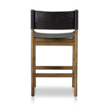 Solid parawood forms a simple, vintage-inspired frame for sling-style seating of black top-grain leather exclusive to Four Hands. Perfectly sized for the counter. Amethyst Home provides interior design, new construction, custom furniture, and area rugs in the Portland metro area.
