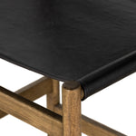 Solid parawood forms a simple, vintage-inspired frame for sling-style seating of black top-grain leather exclusive to Four Hands. Perfectly sized for the counter. Amethyst Home provides interior design, new construction, custom furniture, and area rugs in the Seattle metro area.