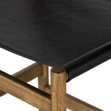 Solid parawood forms a simple, vintage-inspired frame for sling-style seating of black top-grain leather exclusive to Four Hands. Perfectly sized for the counter. Amethyst Home provides interior design, new construction, custom furniture, and area rugs in the Seattle metro area.