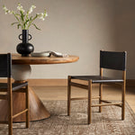 Featuring Kena Vintage Natural Dining Chair by Four Hands at Amethyst Home. Solid parawood forms a simple, vintage-inspired frame for sling-style seating of chocolate top-grain leather.
Collection: WestgateColors: Sonoma Black, Vintage NaturalMaterials: Top Grain Leather, Solid ParawoodOverall Dimensions: 23.50"W x 21"L x 34.50"HWeight: 12.35 lbVolume: 8.69 cu ftSeat Depth: 17.7. Amethyst Home provides interior design, new construction, custom furniture, and area rugs in the Washington metro area.