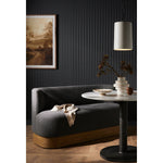 Featuring Krista Knoll Charcoal Dining Bench by Four Hands at Amethyst Home. Style takes shape. Comfortably curved bench seating is upholstered in a chunky charcoal boucle, with water-repellent high-performance fabric for modern sensibility. A plinth-style ash veneer base works casual contrast into the mix. Perfectly sized for a cozy breakfast nook; pai. Amethyst Home provides interior design, new home construction design consulting, vintage area rugs, and lighting in the Newport Beach metro area.
